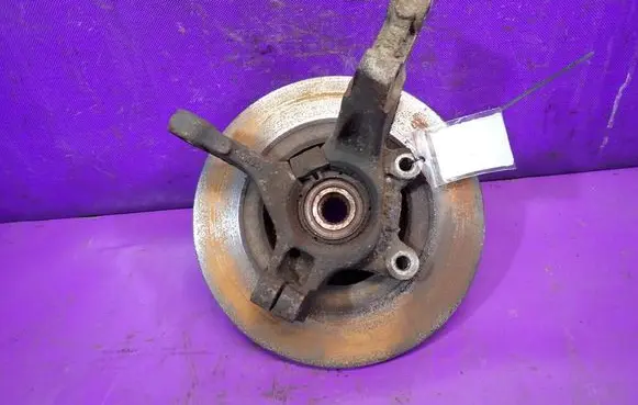 Dacia Logan I Front wheel hub spindle knuckle