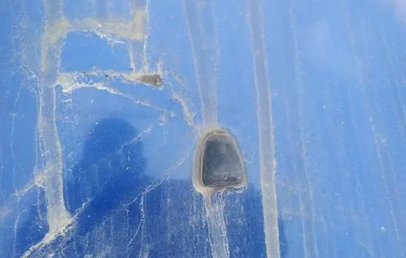 Windshield washer spray nozzle