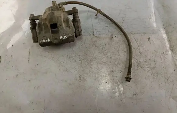 Suzuki Grand Vitara II Front brake caliper