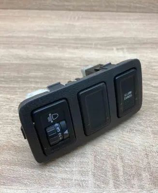 Suzuki Swift I Headlight level height control switch 7331262J10