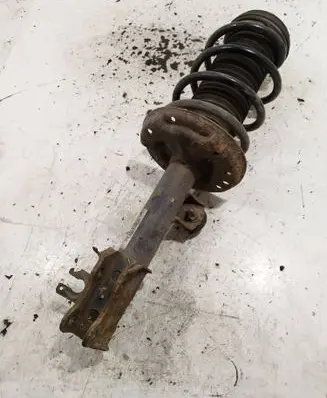 Opel Corsa D Front shock absorber with coil spring 13214357