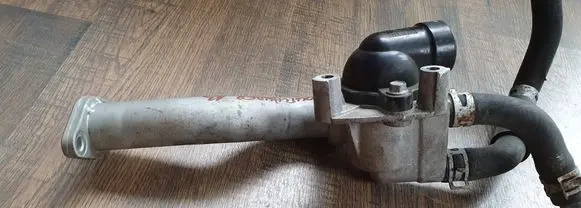 Thermostat/thermostat housing