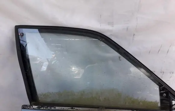 Mazda 626 Front door window glass four-door