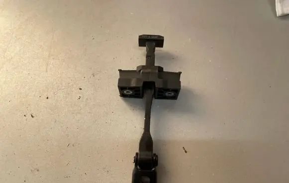 BMW 2 F46 Rear door check strap stopper