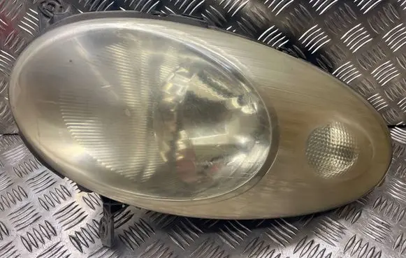 Nissan Micra Headlight/headlamp 89900074