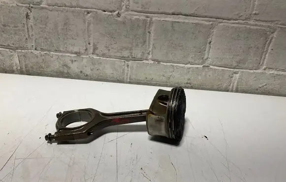 Piston with connecting rod