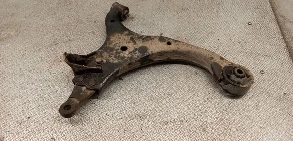 KIA Carens II Front lower control arm/wishbone 