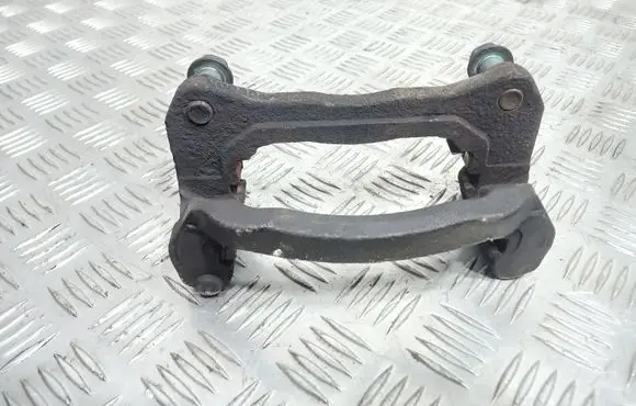 Mazda CX-7 Front Brake Caliper Pad/Carrier 