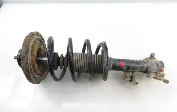 Nissan Primera Front shock absorber with coil spring 