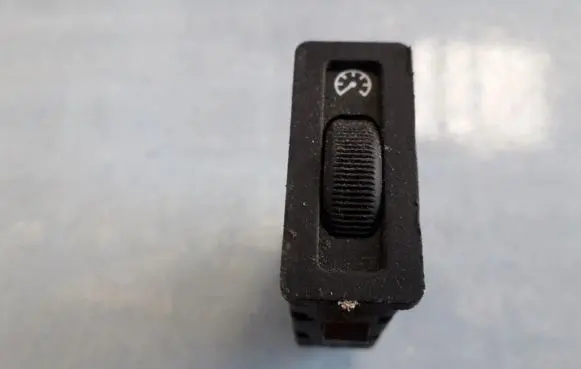 Panel lighting control switch