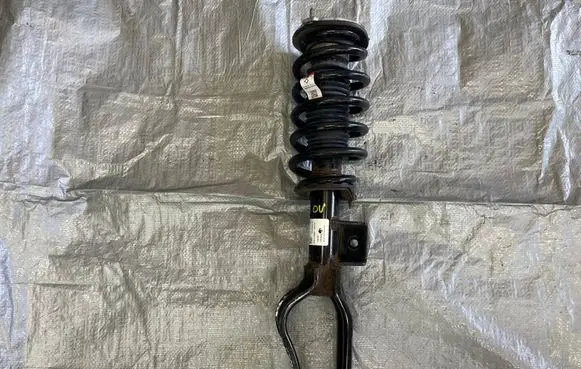 Tesla Model 3 Front shock absorber/damper 104436300F AQP200432B33110
