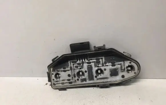 Tail light bulb cover holder