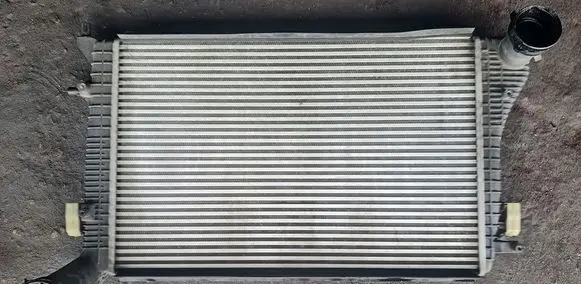 Volkswagen Touran I Intercooler radiator 1K0145803AL