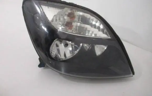 Renault Scenic I Headlight/headlamp 7700432095