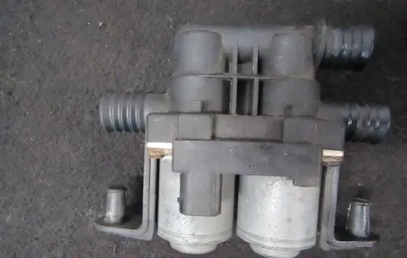 Coolant heater control valve
