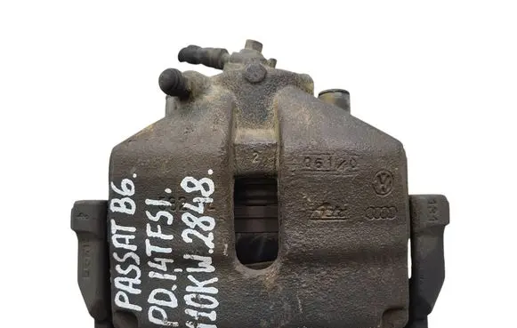 Volkswagen PASSAT B6 Front brake caliper 
