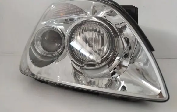 KIA Carens II Headlight/headlamp 2357NA