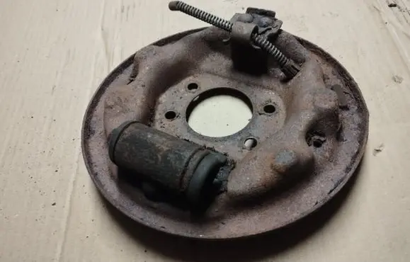Ford Taurus Rear brake disc plate dust cover 