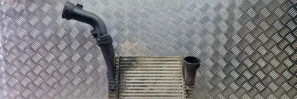 Volkswagen Touareg I Intercooler radiator 7L6145957A