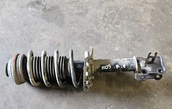 Opel Zafira B Front shock absorber/damper 22214600 24466541 644609745