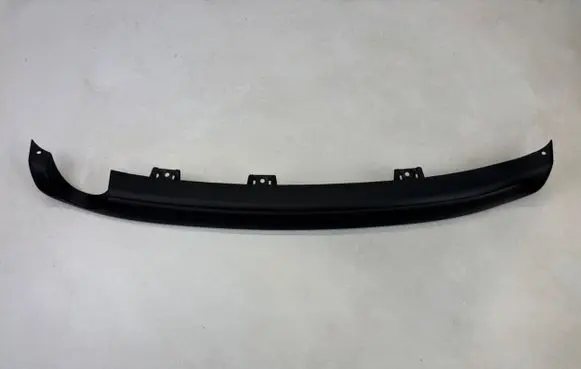 Rear bumper trim bar molding