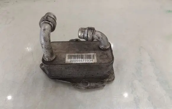 Opel Insignia A Engine oil radiator 6534234