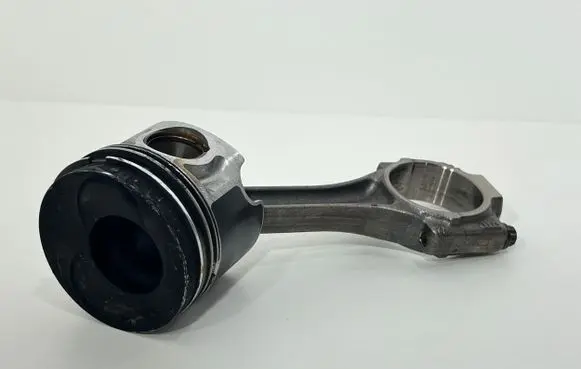 Volkswagen Caddy Piston with connecting rod 038G