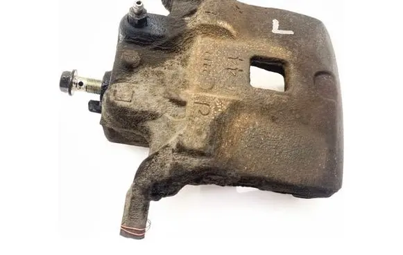 Nissan Juke I F15 Front brake caliper
