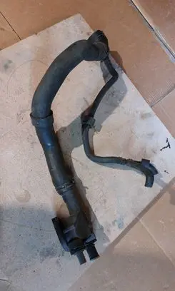 Volkswagen PASSAT B6 Engine coolant pipe/hose 03G121132B
