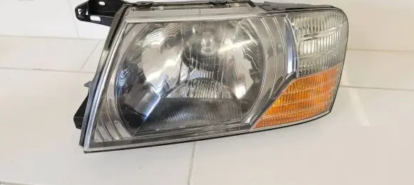Mitsubishi Pajero Headlight/headlamp 10087420