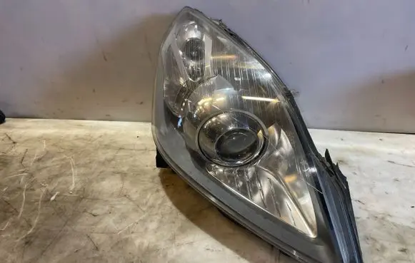 Opel Zafira B Headlight/headlamp LE04B6120