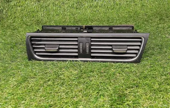 Dash center air vent grill