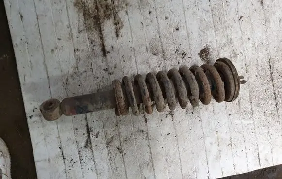 Toyota Land Cruiser (HDJ90) Front shock absorber with coil spring NOCODE