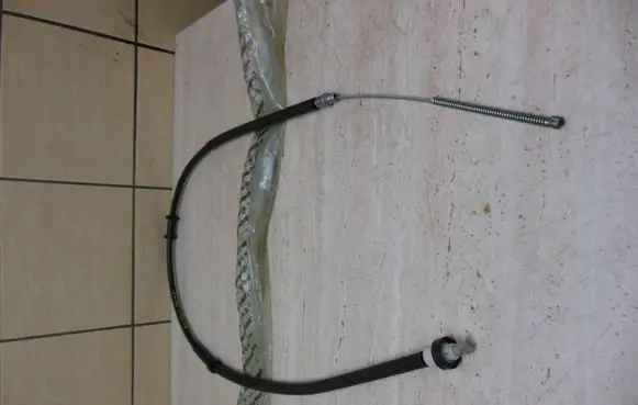 Lancia Ypsilon Hand brake release cable 51900231