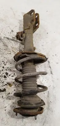 Front shock absorber with coil spring