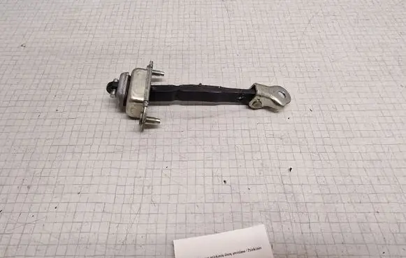 Subaru Outback Front door check strap stopper
