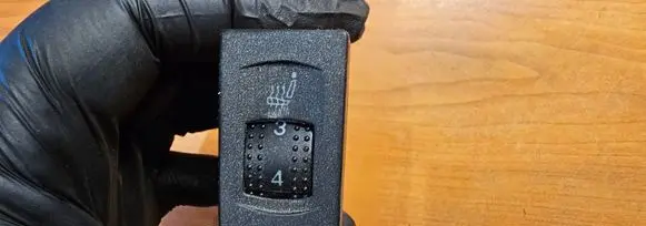 Seat heating switch