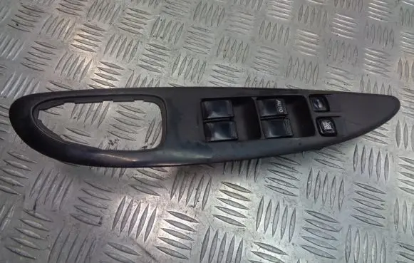 Nissan Primera Front door window switch trim 