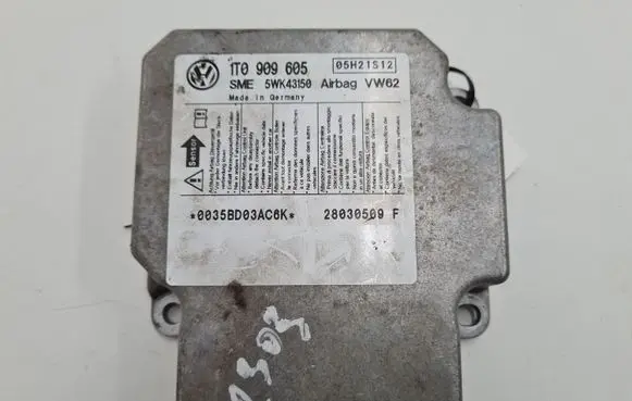 Volkswagen Touran I Airbag control unit/module 1T0909605