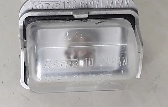 Mazda 6 Number plate light 13061971