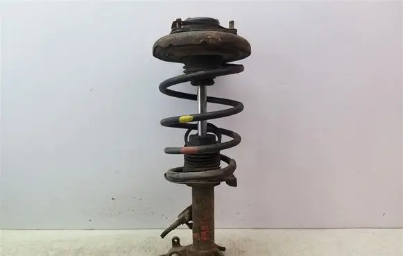Nissan Primera Front shock absorber with coil spring