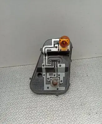 Volkswagen Touareg I Tail light bulb cover holder 7L6945257