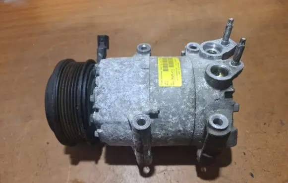 Ford Fiesta Air conditioning (A/C) compressor (pump) AV1119D629
