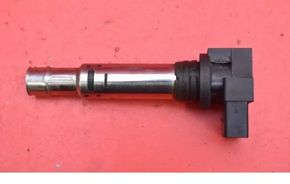 Volkswagen Golf V High voltage ignition coil 0040102030