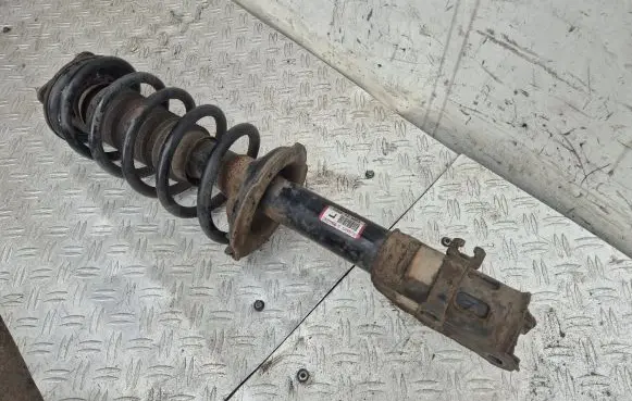 Mazda CX-7 Front shock absorber with coil spring EH6434900A 2A22868B 6494632