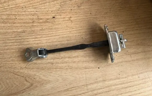 Suzuki Splash Front door check strap stopper