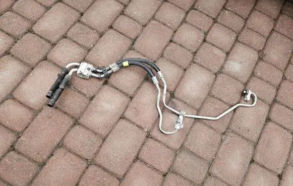 Opel Astra K Gearbox oil cooler pipe/hose 13374062- 39014807