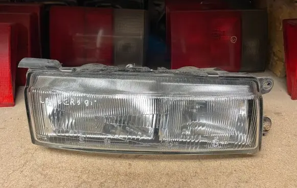 Mitsubishi Lancer Headlight/headlamp 0014463 0014458