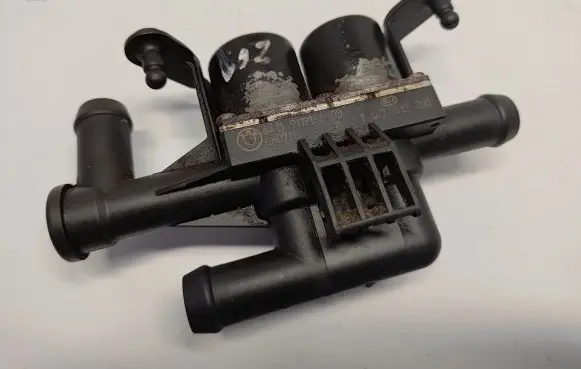 Coolant heater control valve