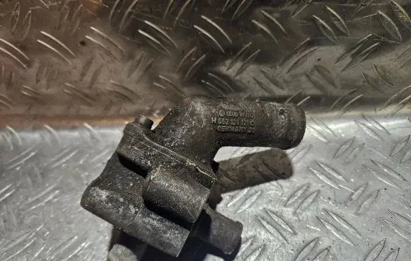 Thermostat/thermostat housing